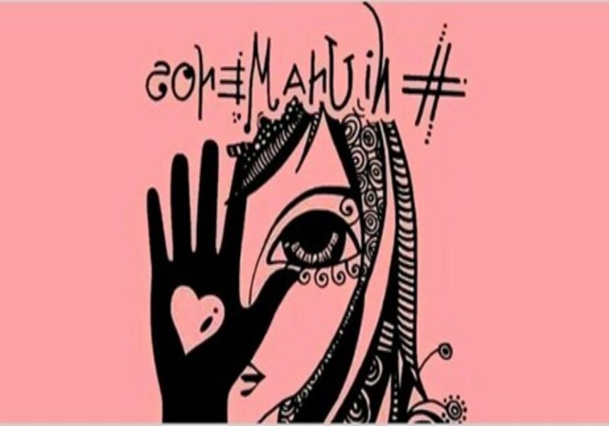 Mano negra con dibujo corazón sobre cara de mujer